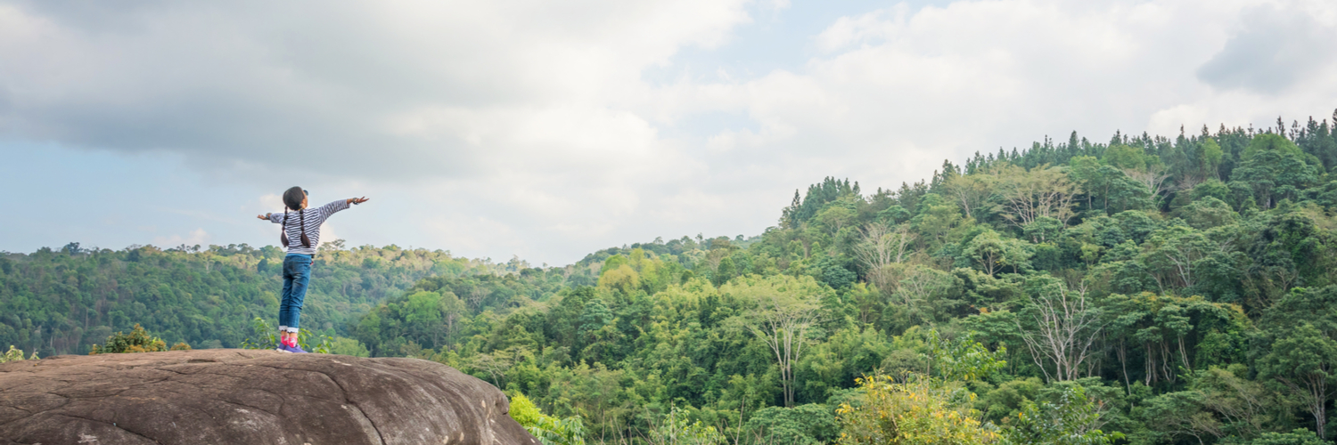 child enjoying nature abroad